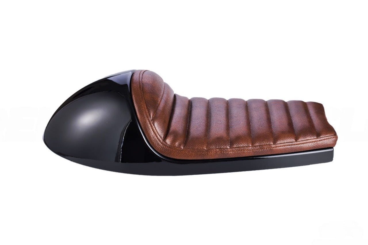Brown leather motorcycle seat with black plastic backing on a white background