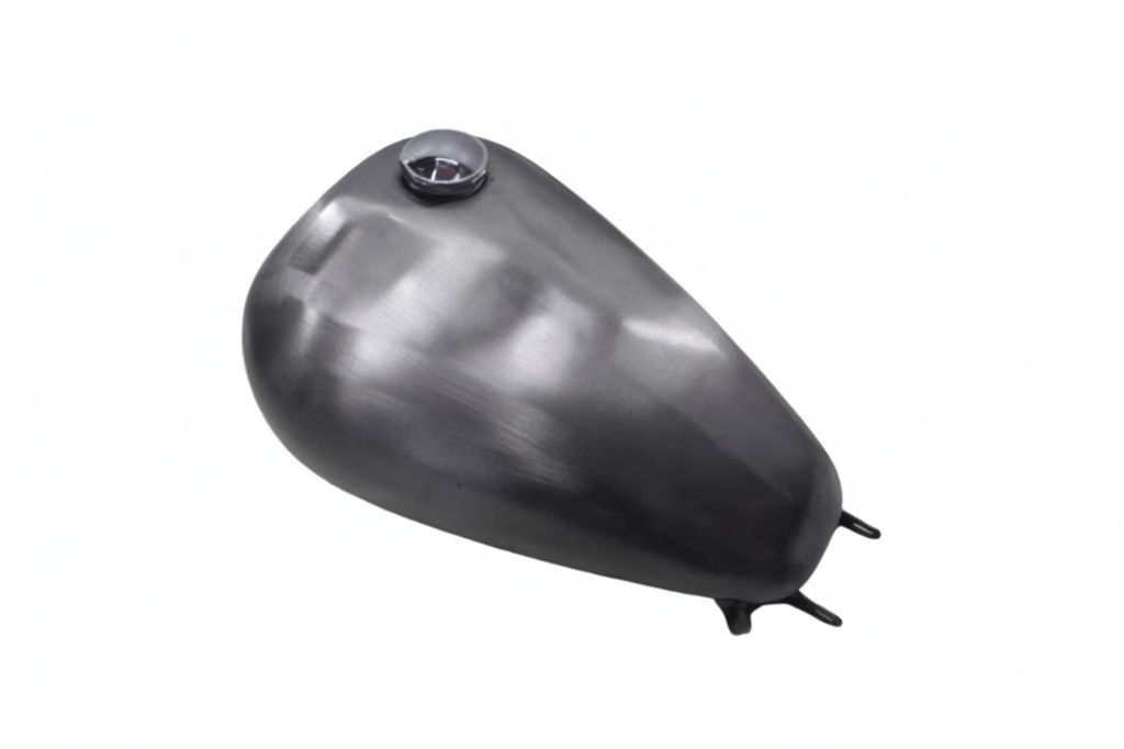 A silver-colored metal gas tank for Harley Davidson DYNA with a vintage chopper bobber style design.