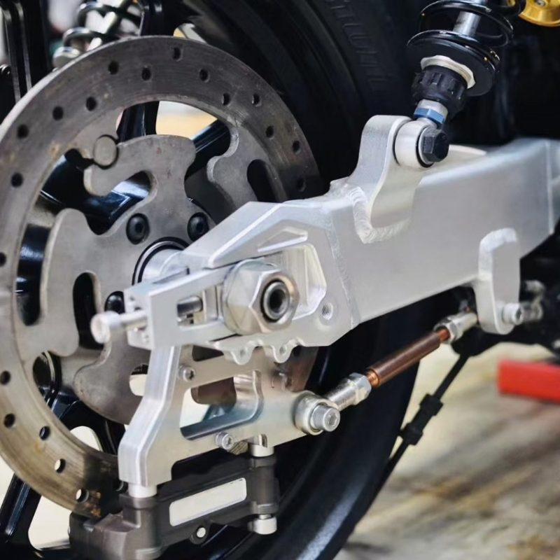 Aluminum swingarm with 100 mm radial caliper bracket for Dyna