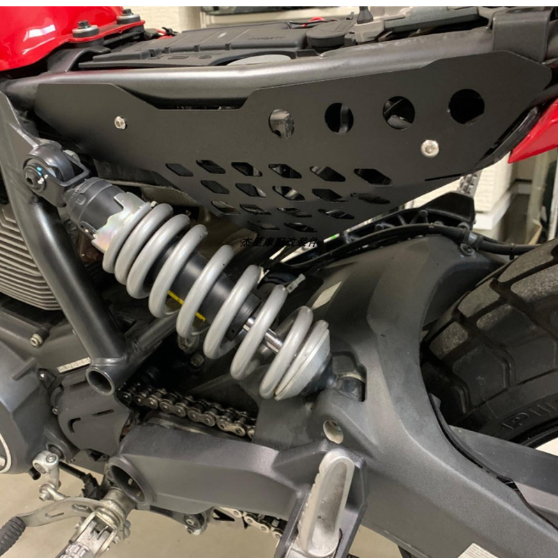 Laser-cut aluminum side covers for Scrambler 800