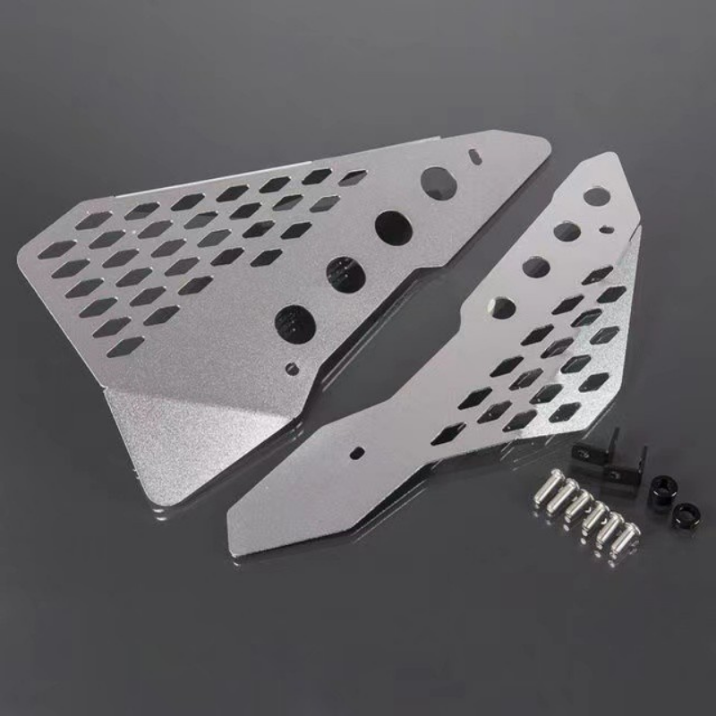 Laser-cut aluminum side covers for Scrambler 800