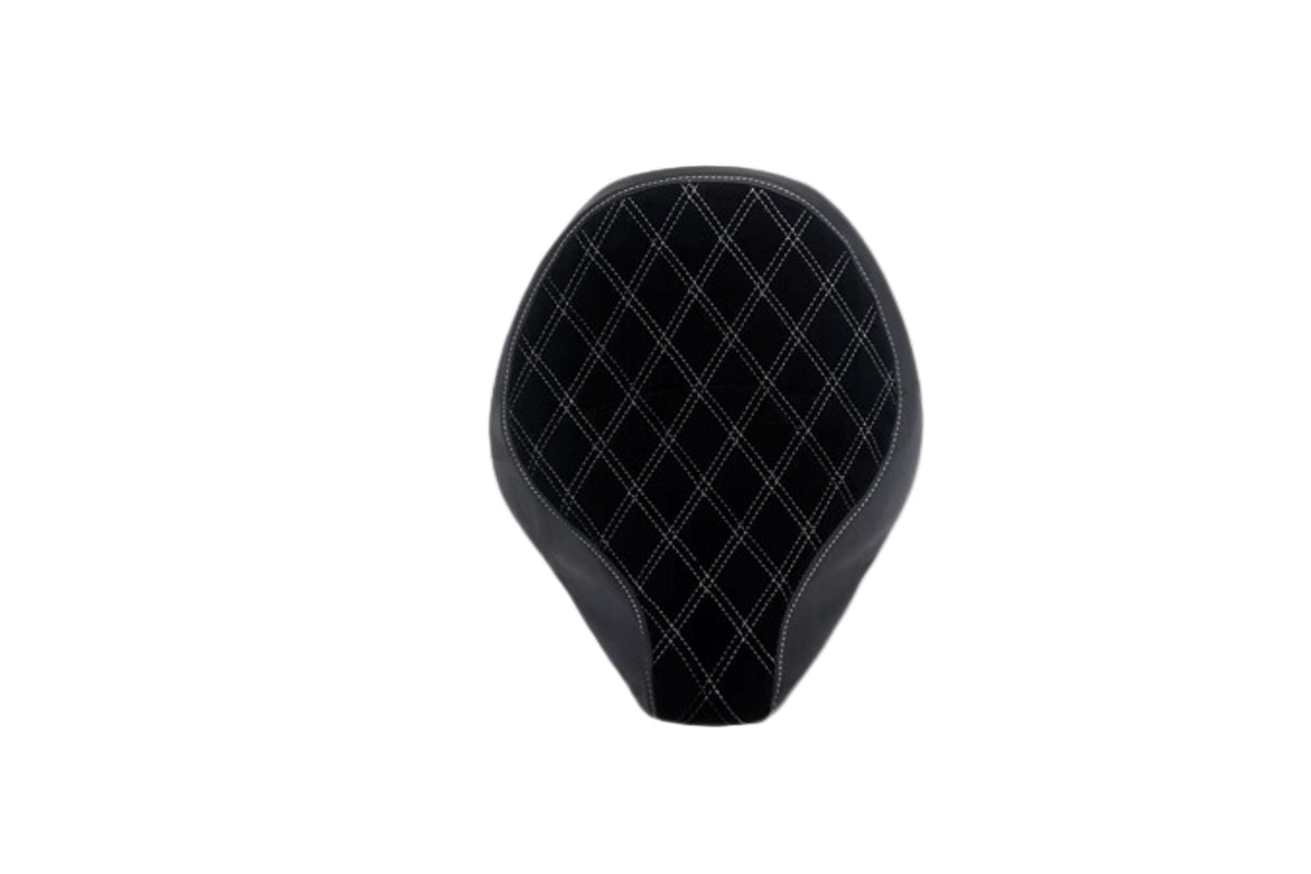 Custom black seat mounted on a Triumph Bobber motorcycle, showcasing the seat's contour and fit without the need for text description.