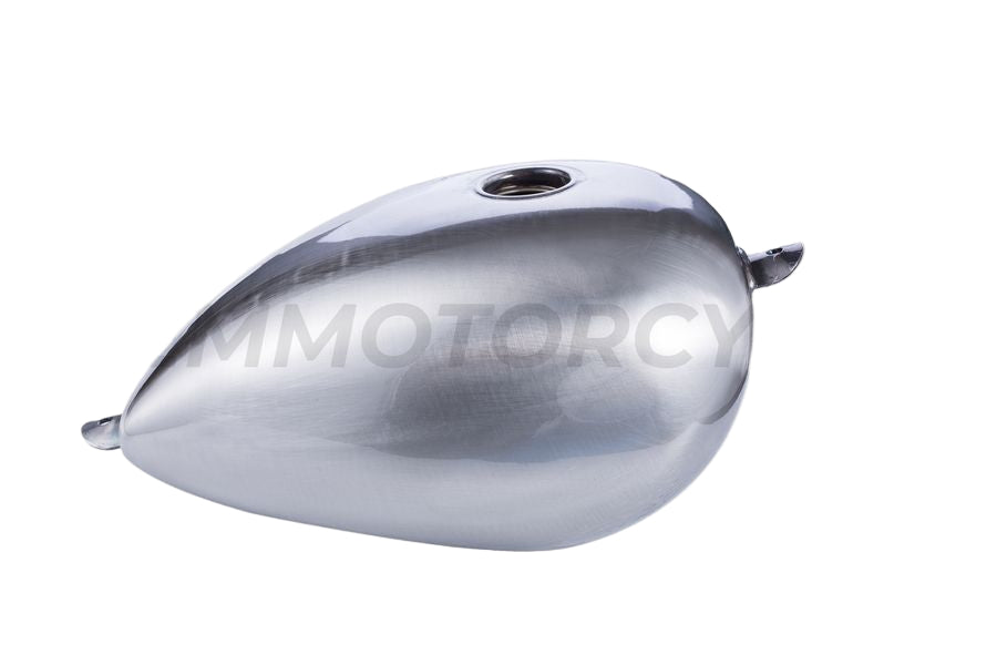 A silver metal motorcycle fuel tank with a teardrop shape, designed for bobber or chopper bikes