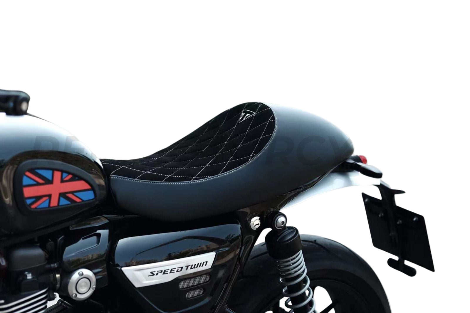 Black cafe racer seat with a Union Jack design on the side, mounted on a motorcycle